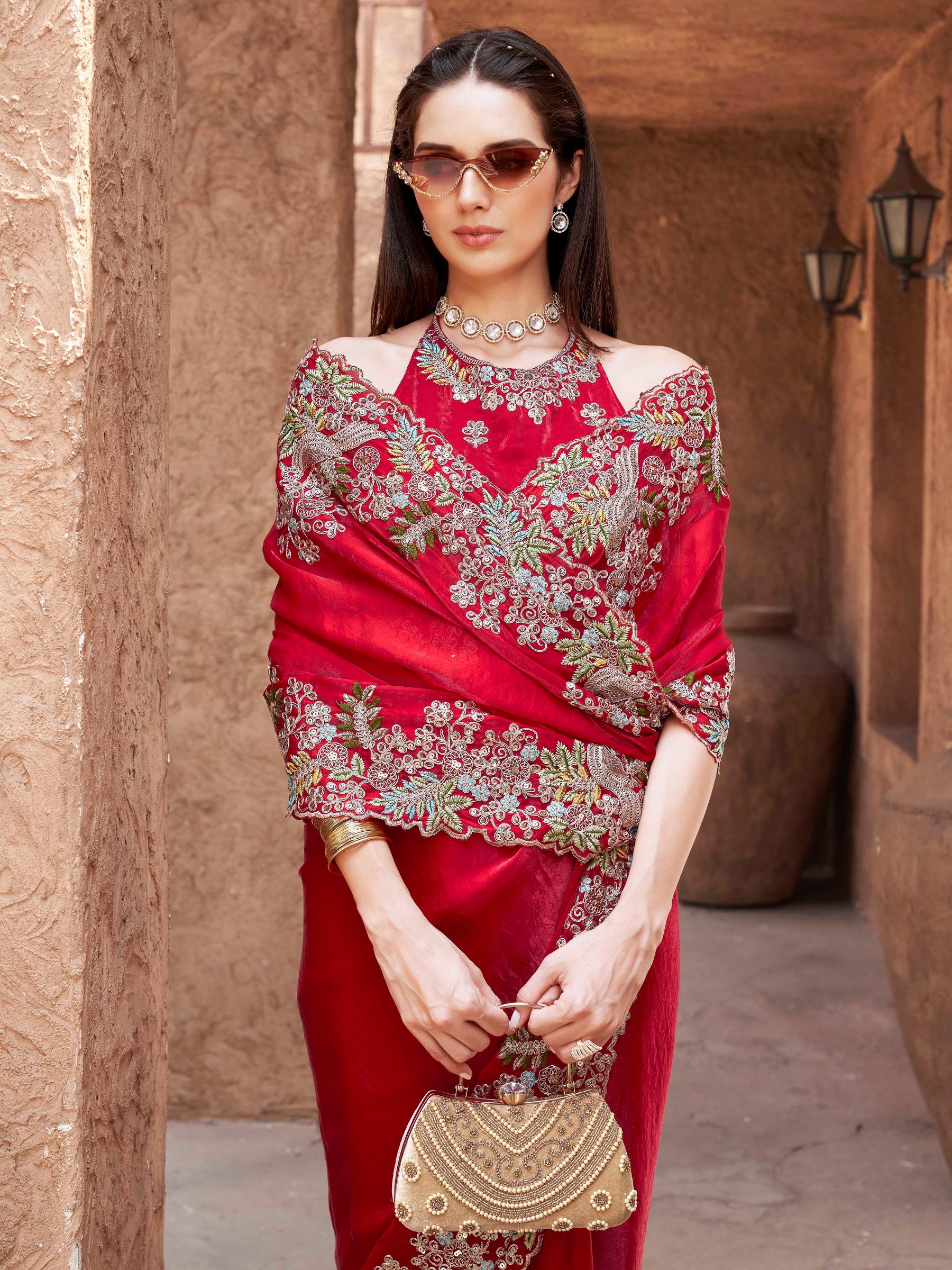 red colored designer jimmy choo saree with sequinned embroidery border